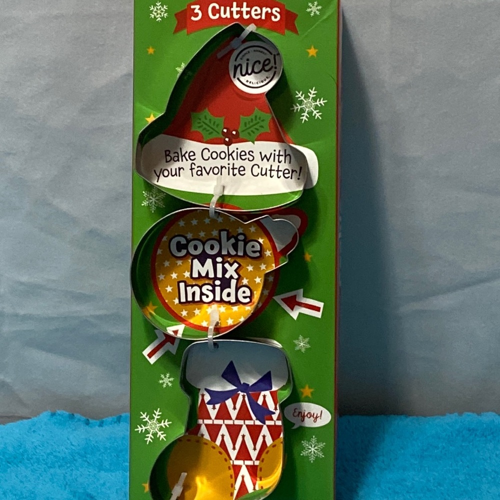 Christmas Cookie Cutters with cookie mix inside